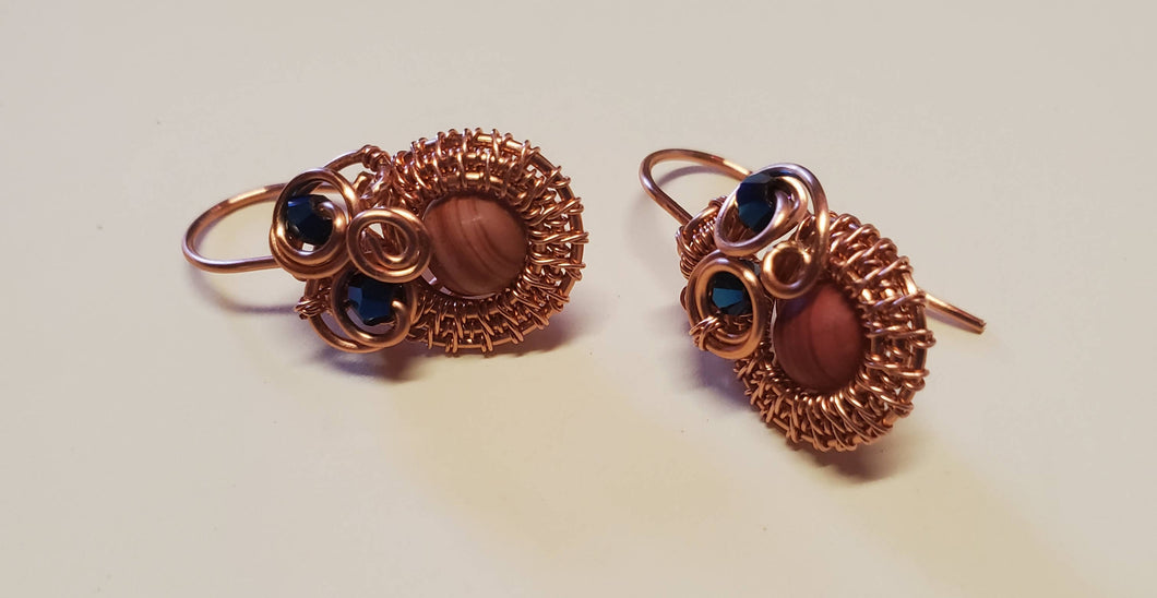 Copper non tarnish earrings with a sunstone focal bead and Blue Swarovski crystals